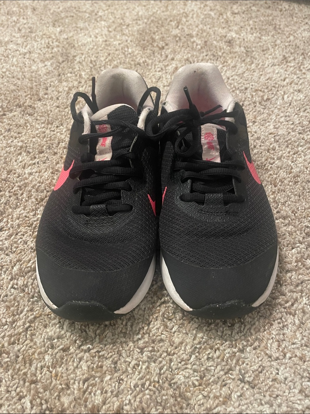 Nike Black Sneakers with Pink Swoosh Accents